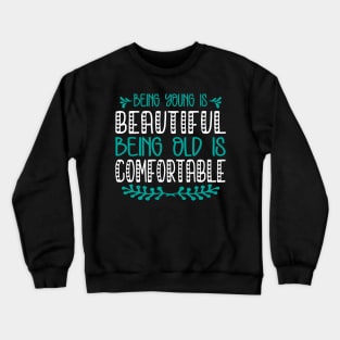 Being young is beautiful being old is comfortable Crewneck Sweatshirt